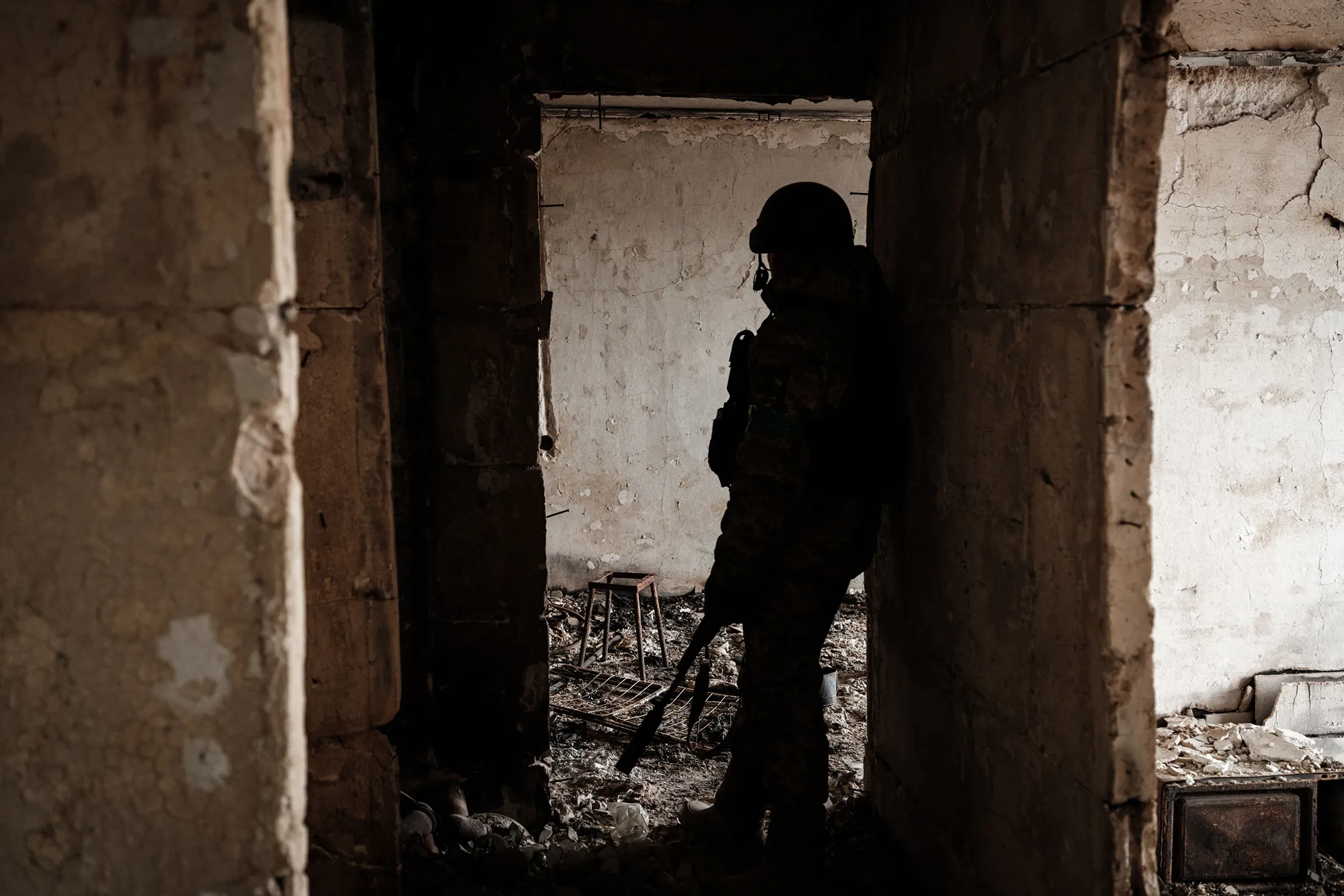A Ukrainian serviceman of the State Border Guard Service works in a position in Bakhmut on Feb.&nbsp;9.