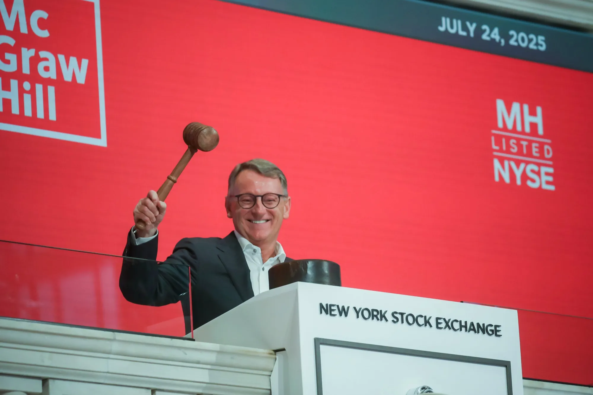 Simon Allen, chief executive officer of McGraw Hill Inc., on the floor of the New York Stock Exchange&nbsp;during the company's IPO on Thursday.