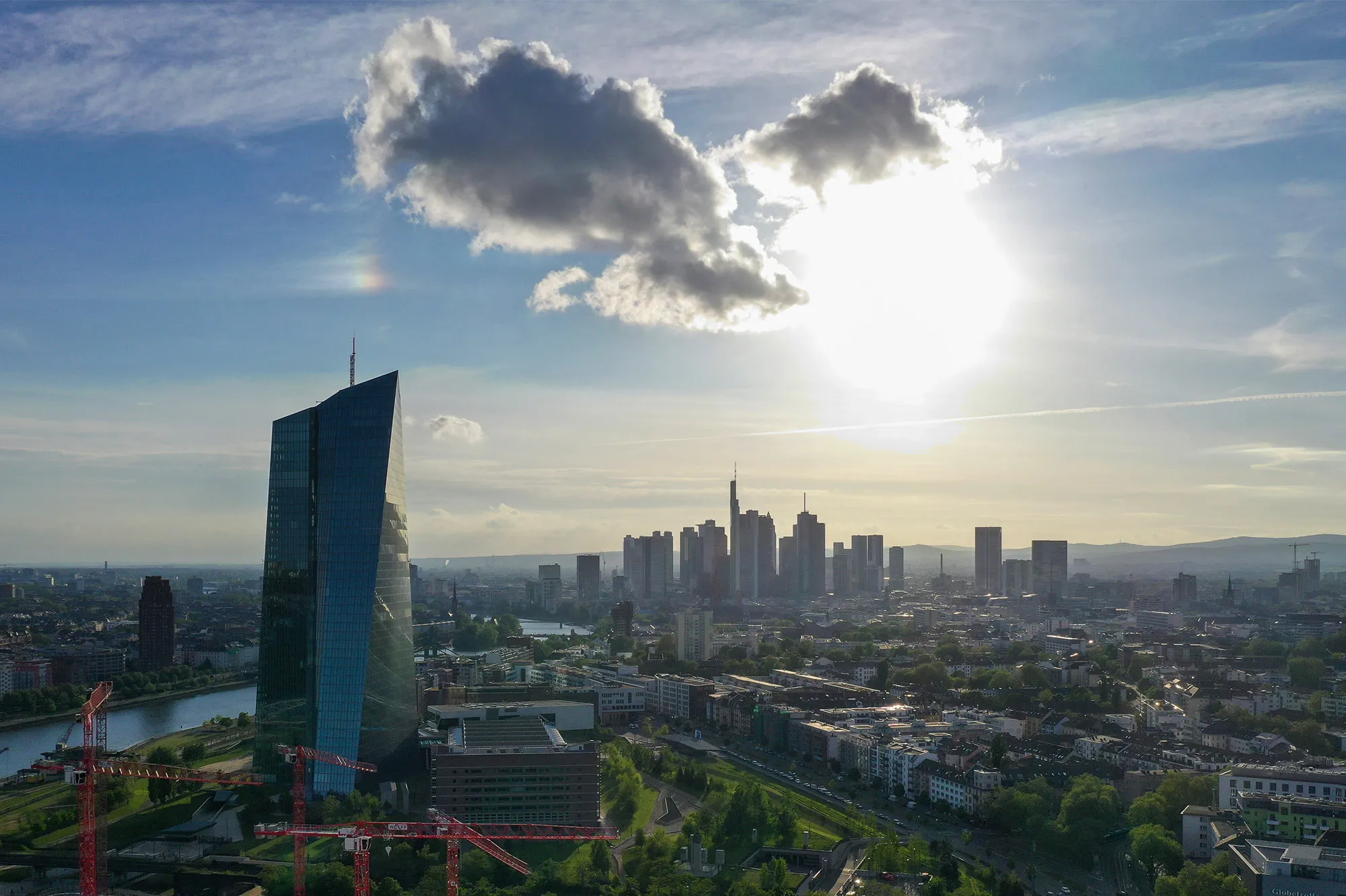 The European Central Bank (ECB) headquarters, left.