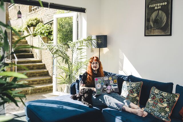 Samantha Betts' sitting on the sofa of her living room. Her new job allows her to work from home in Margate.