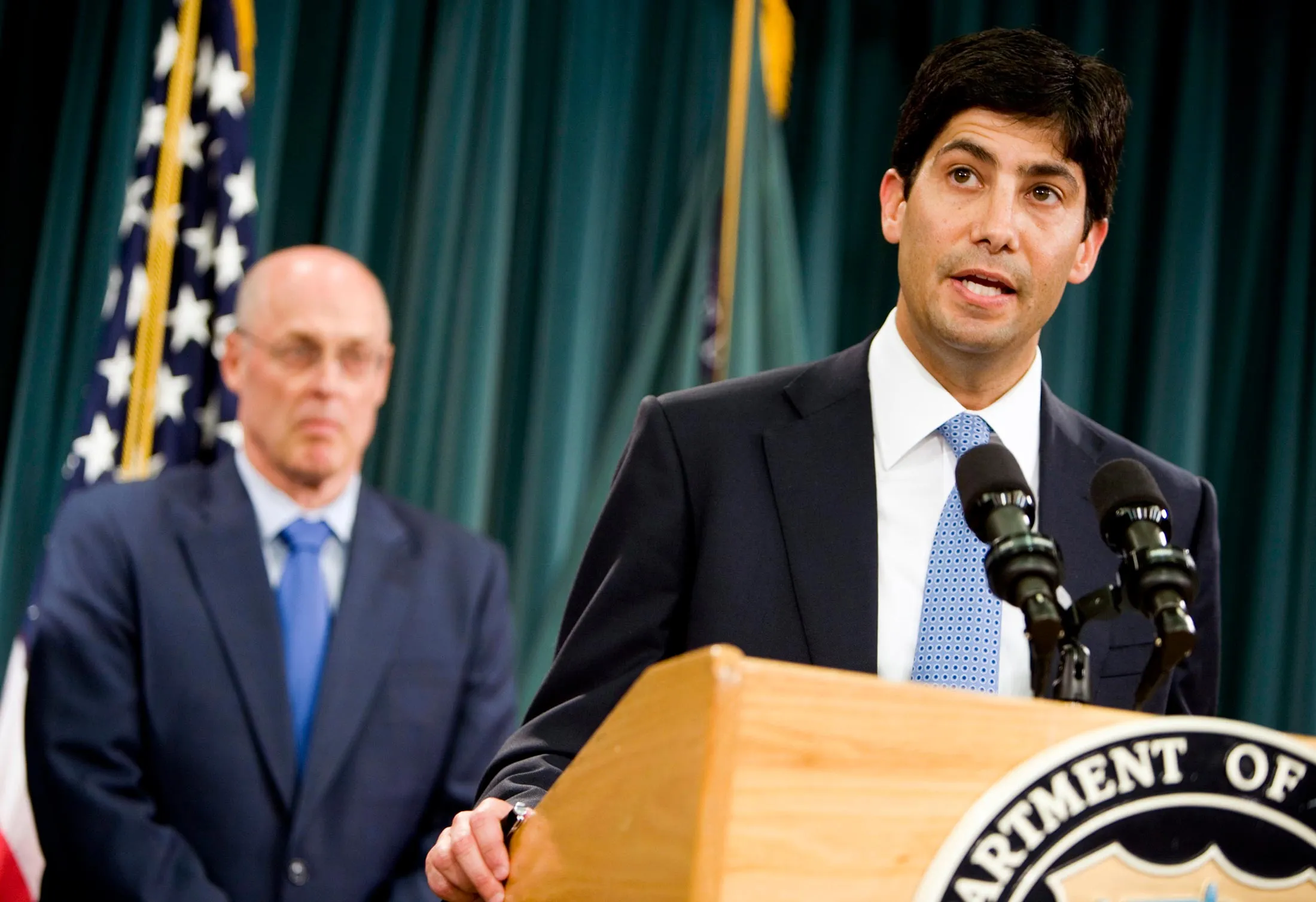 Warsh speaks at a news conference with then-Treasury Secretary Henry Paulson during the 2008 financial crisis.
