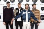 Members of the group Glass Animals, from left, Edmund Irwin-Singer, Joe Seaward, Dave Bayley and Drew MacFarlane appear at the Mercury Prize 2017 awards in London on Sept. 14, 2017. The band is nominated for a Grammy Award for best new artist. (Photo by Grant Pollard/Invision/AP, File)