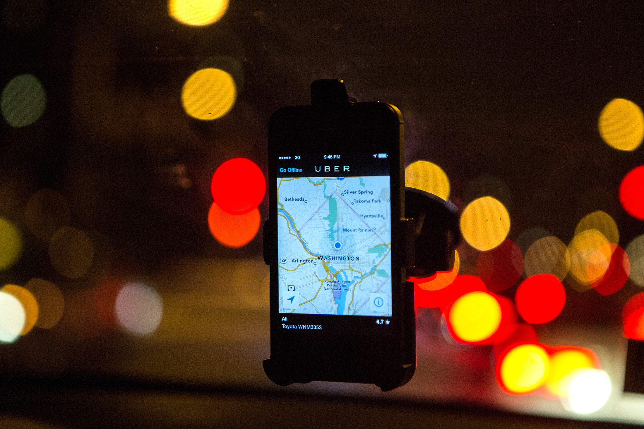 WASHINGTON, DC - APR 4:  The Uber driver app on the windshield