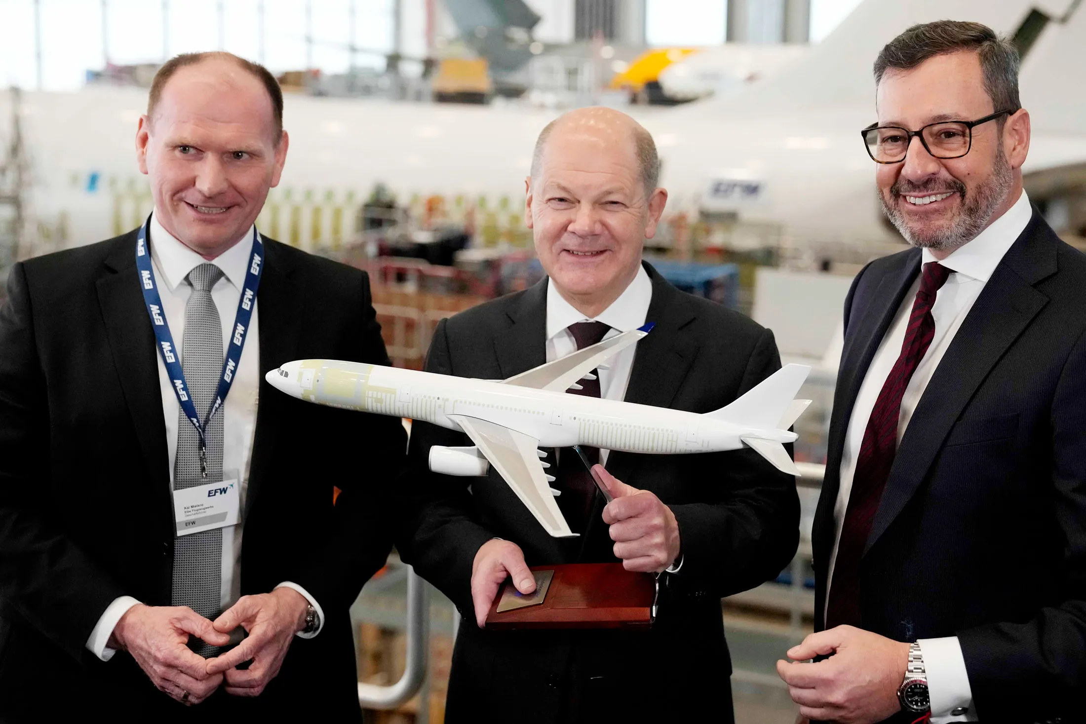 Olaf Scholz, center, during a tour of the EFW Elbe Flugzeugwerke aircraft plant in Dresden on Feb. 29.