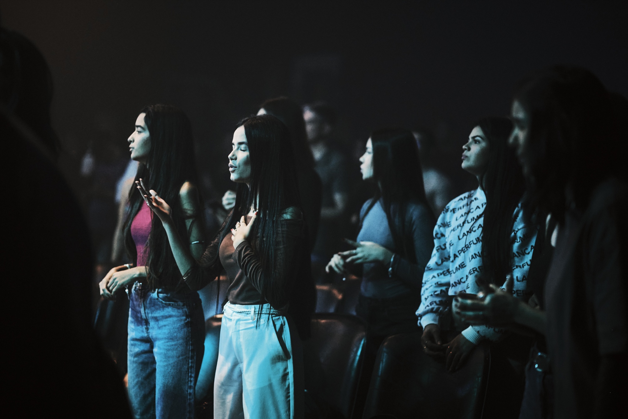 Young Brazilians listen as a pop-rock gospel band plays during a youth service at the Casa Church in Goiânia. Photographer: Gustavo Minas/Bloomberg