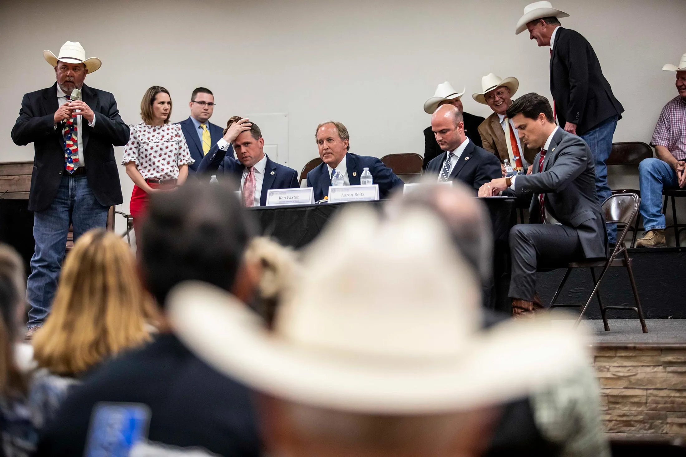 Paxton (third from left) in Inez, Texas,&nbsp;in May, at a border-issues town hall.