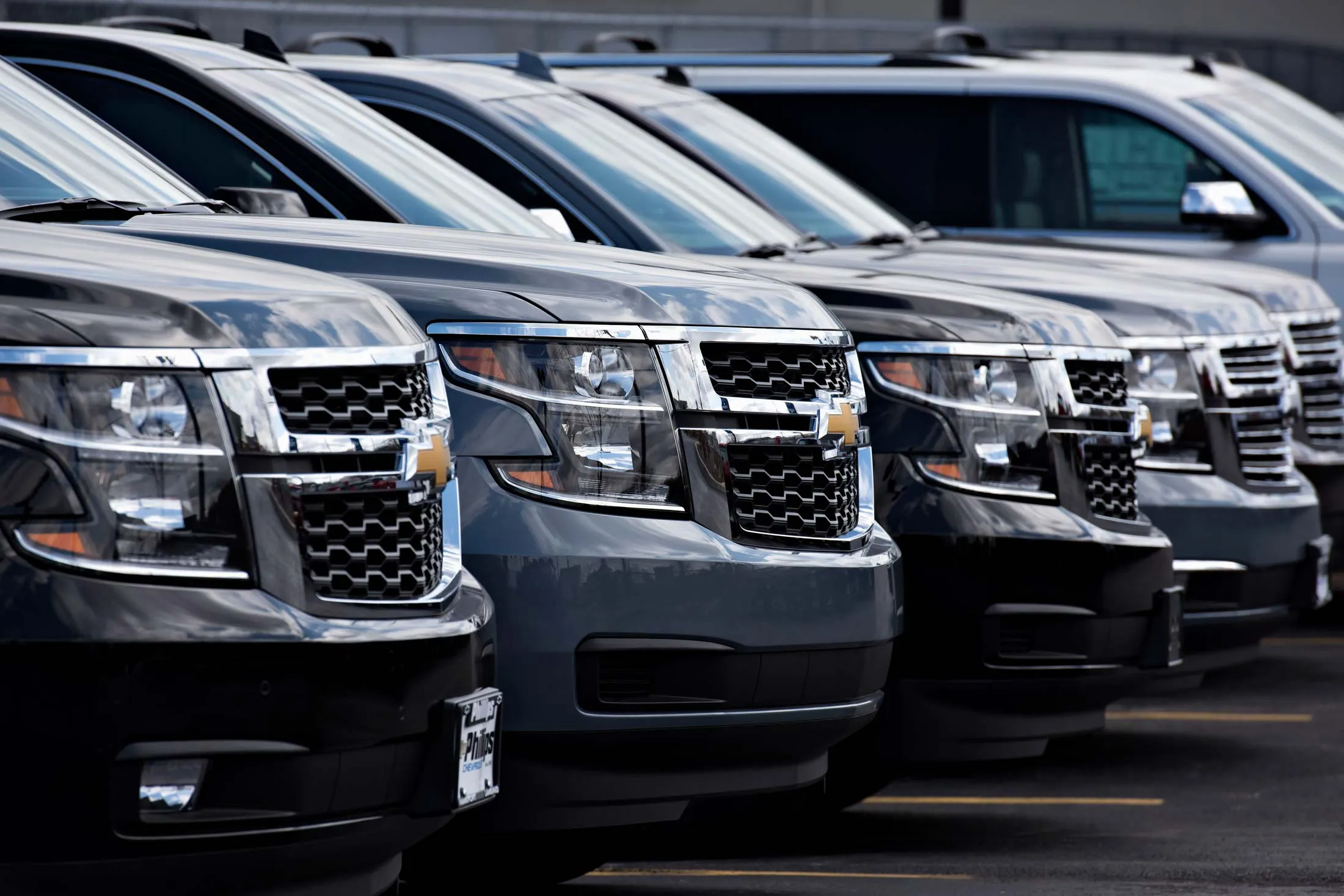 Chevrolet Suburban sport utility vehicles for sale at a dealership in Frankfort, Ill.
