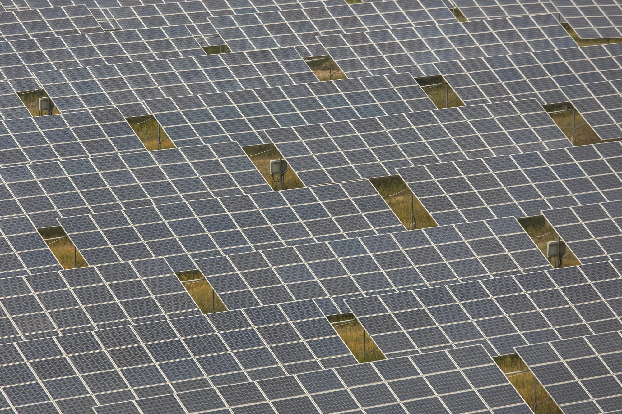 Photovoltaic panels at a solar farm operated by Yellow River Power in Gonghe County, Qinghai province, China.