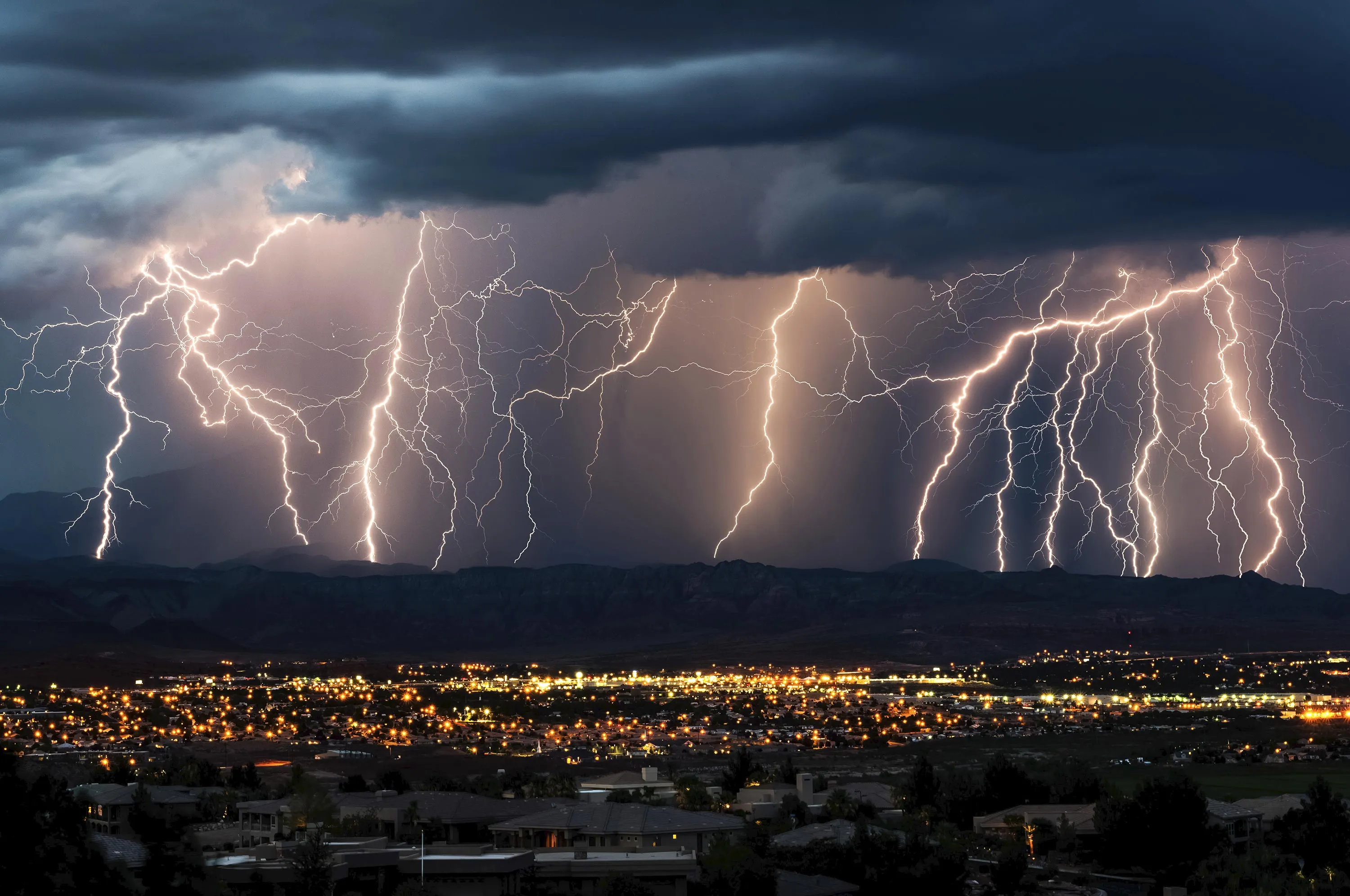 Multiple lightning strikes on a stormy evening near St. George, Utah. Photographer: Jer Barber/Getty Images