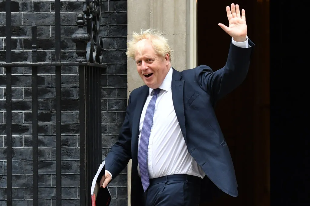 British Prime Minister Boris Johnson waves as he leaves Downing Street on Sept.&nbsp;8.
