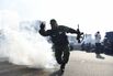 Venezuelan Soldiers Don Blue Armbands in Uprising: Photo Essay
