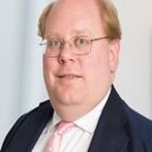 Headshot of Charles Brasted