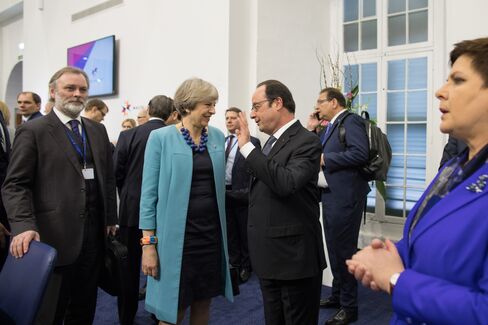 Francois Hollande speaks to Theresa May on Feb. 3.