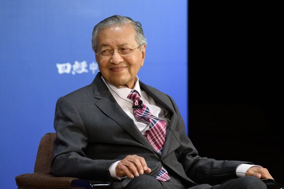 Mahathir Worries About Job Losses on Merger with Malaysia’s Biggest Wireless Carrier