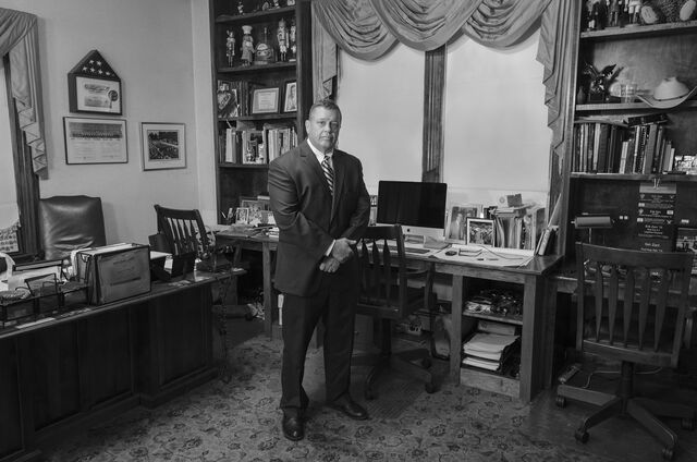 Portrait of Lt. Al Zani in his home office. Danvers, MA.