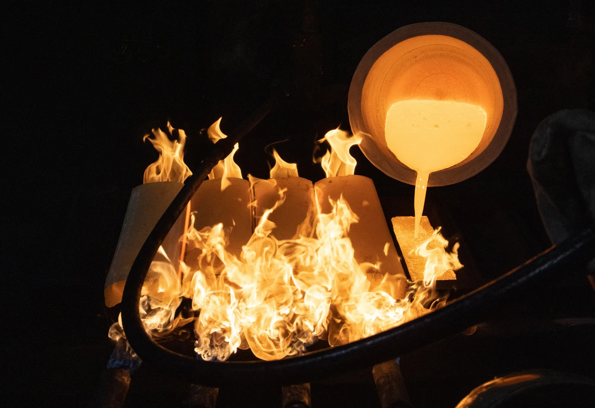 A worker pours molten gold into a mold at a foundry&nbsp;in Kasimov, Russia.