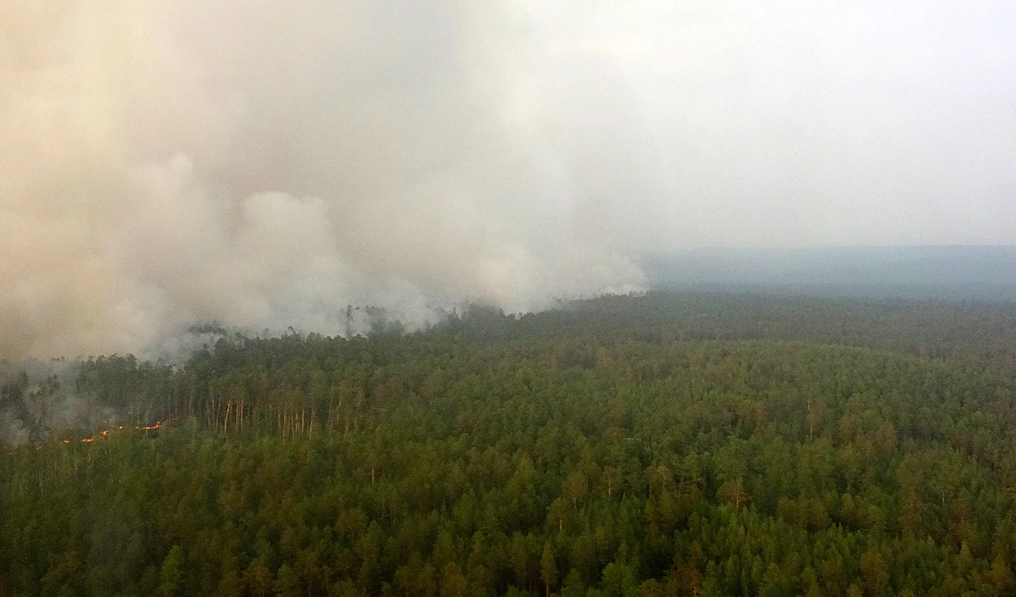 A wildfire seen from an amphibious aircraft in Siberia on July 28