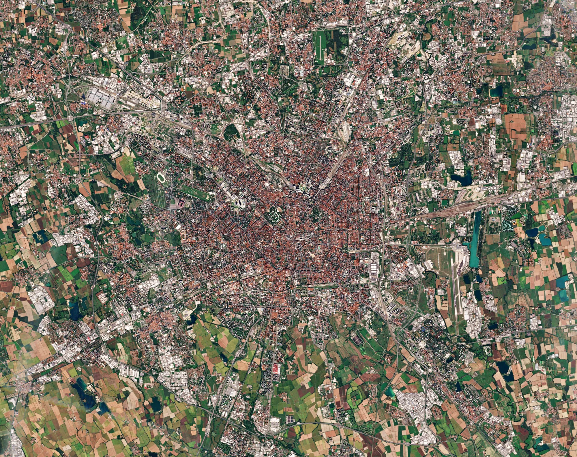Milan’s rooftops rendered by the European Space Agency’s CORINA Land Cover satellite service.