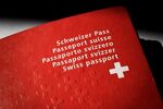 A Swiss biometric passport is photographed in Lausanne on September 15, 2018. - - (Photo by Fabrice COFFRINI / AFP) (Photo by FABRICE COFFRINI/AFP via Getty Images) Photographer: FABRICE COFFRINI/AFP