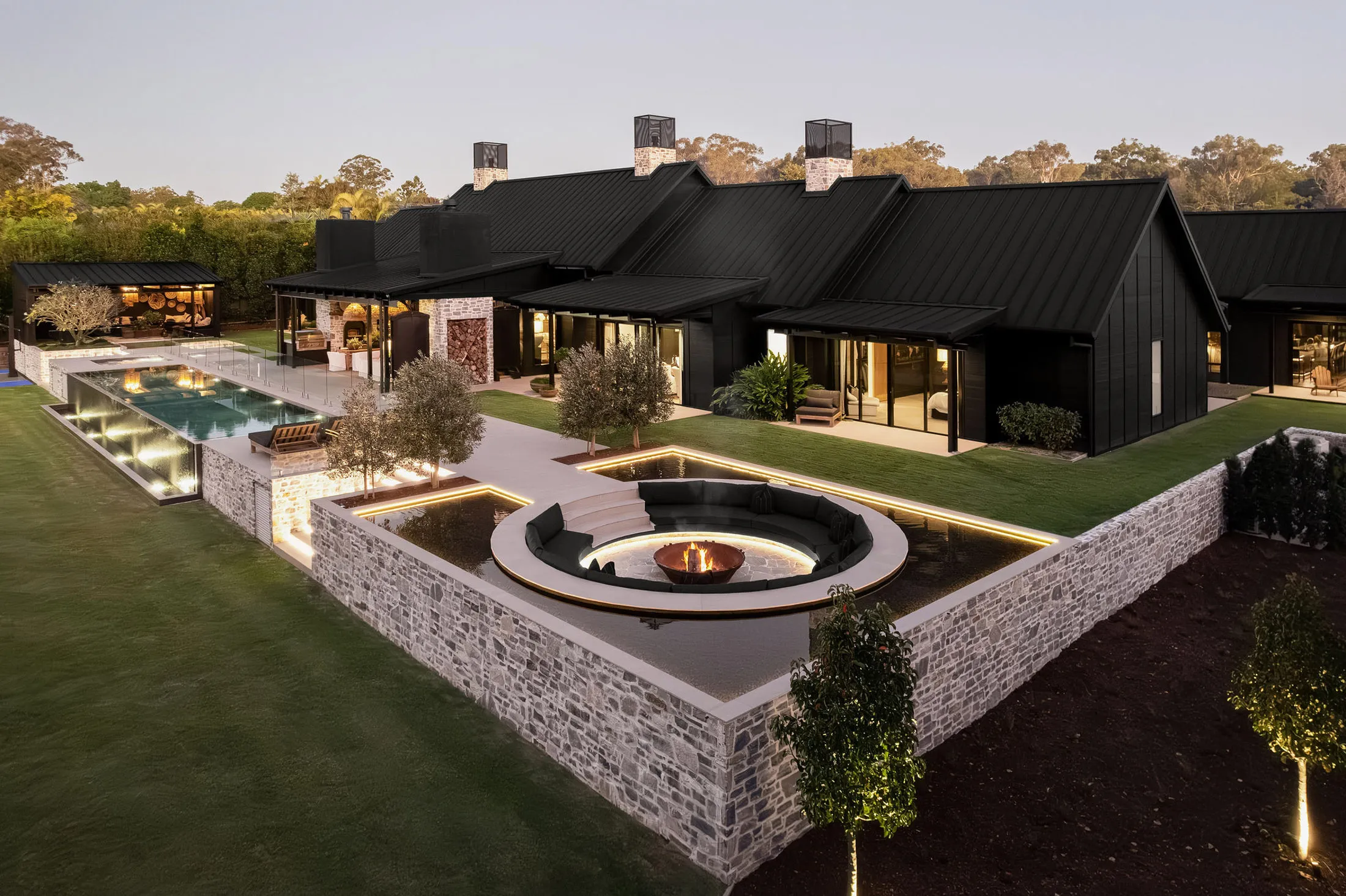 The rear of the home is oriented toward&nbsp;outdoor entertainment.