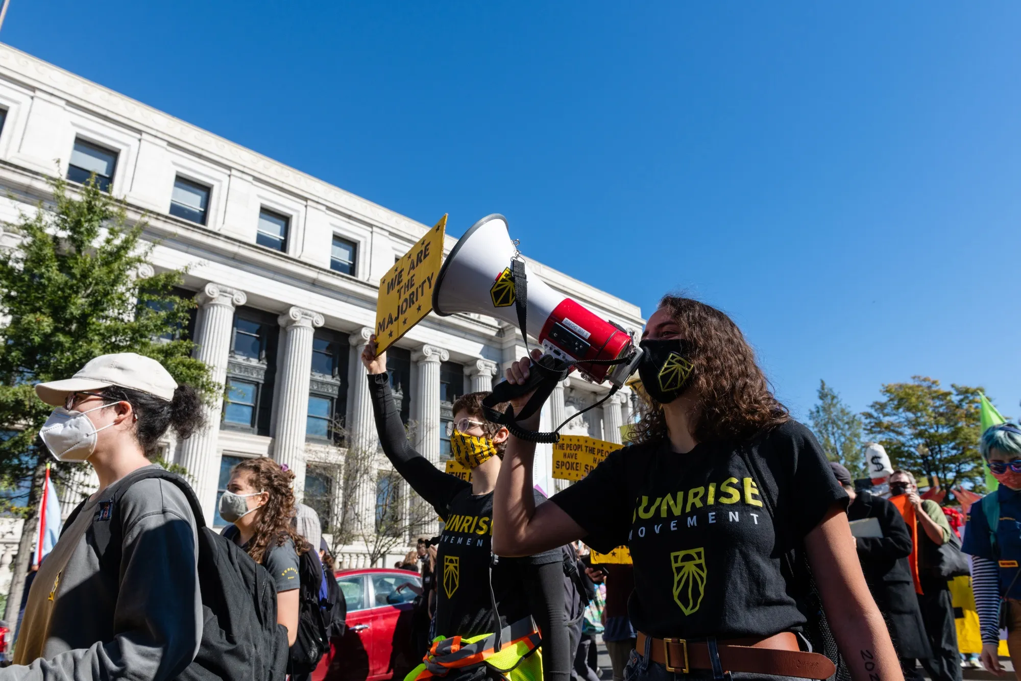 Climate activists shout slogans while marching at a protest during the 2020 Presidential election in Washington, D.C. on Nov. 4, 2020.