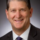 Headshot of Roger L Kearns