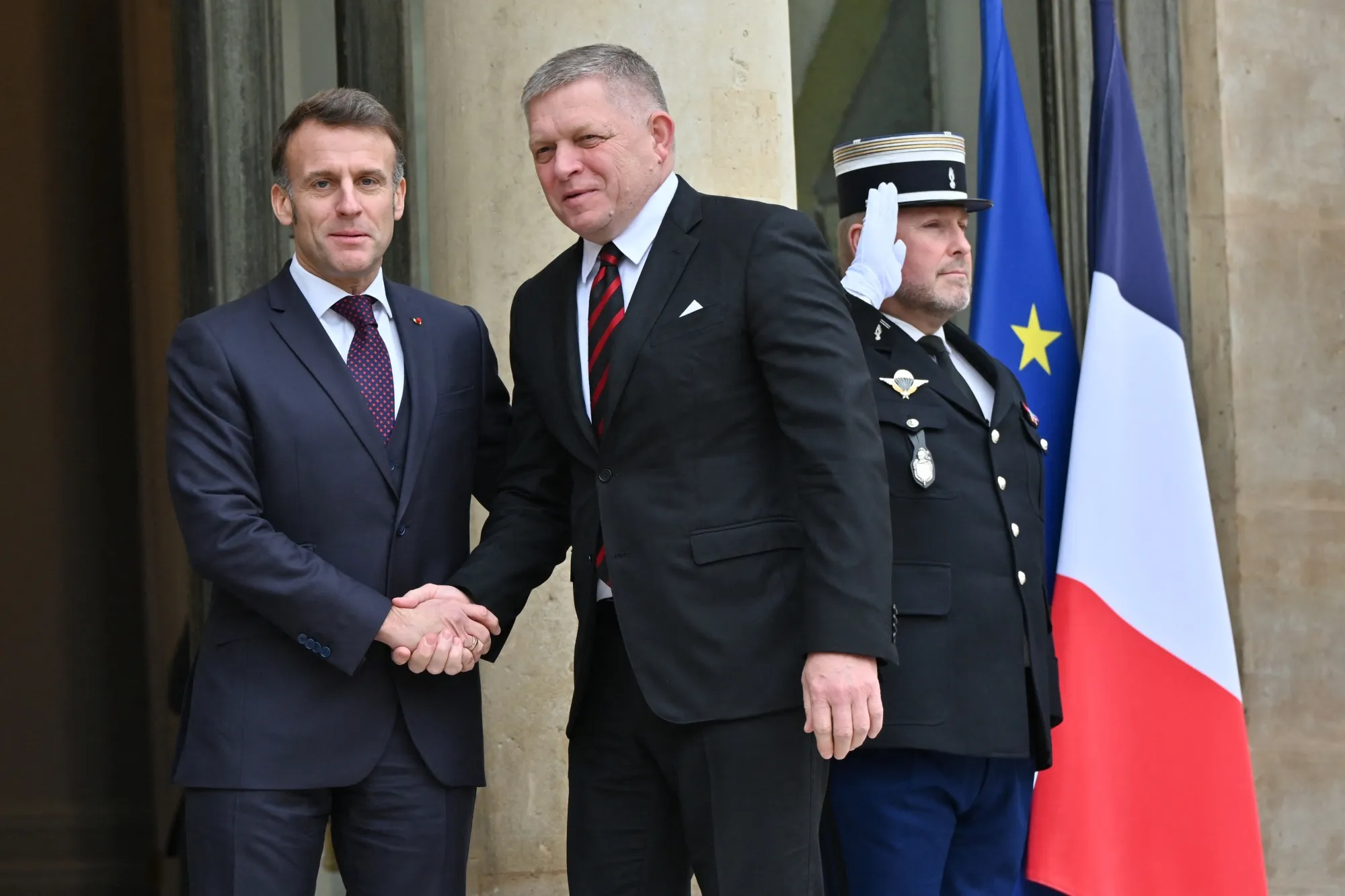 Emmanuel Macron, left, welcomes Robert Fico at the Elysee Palace in Paris, on Jan. 29.