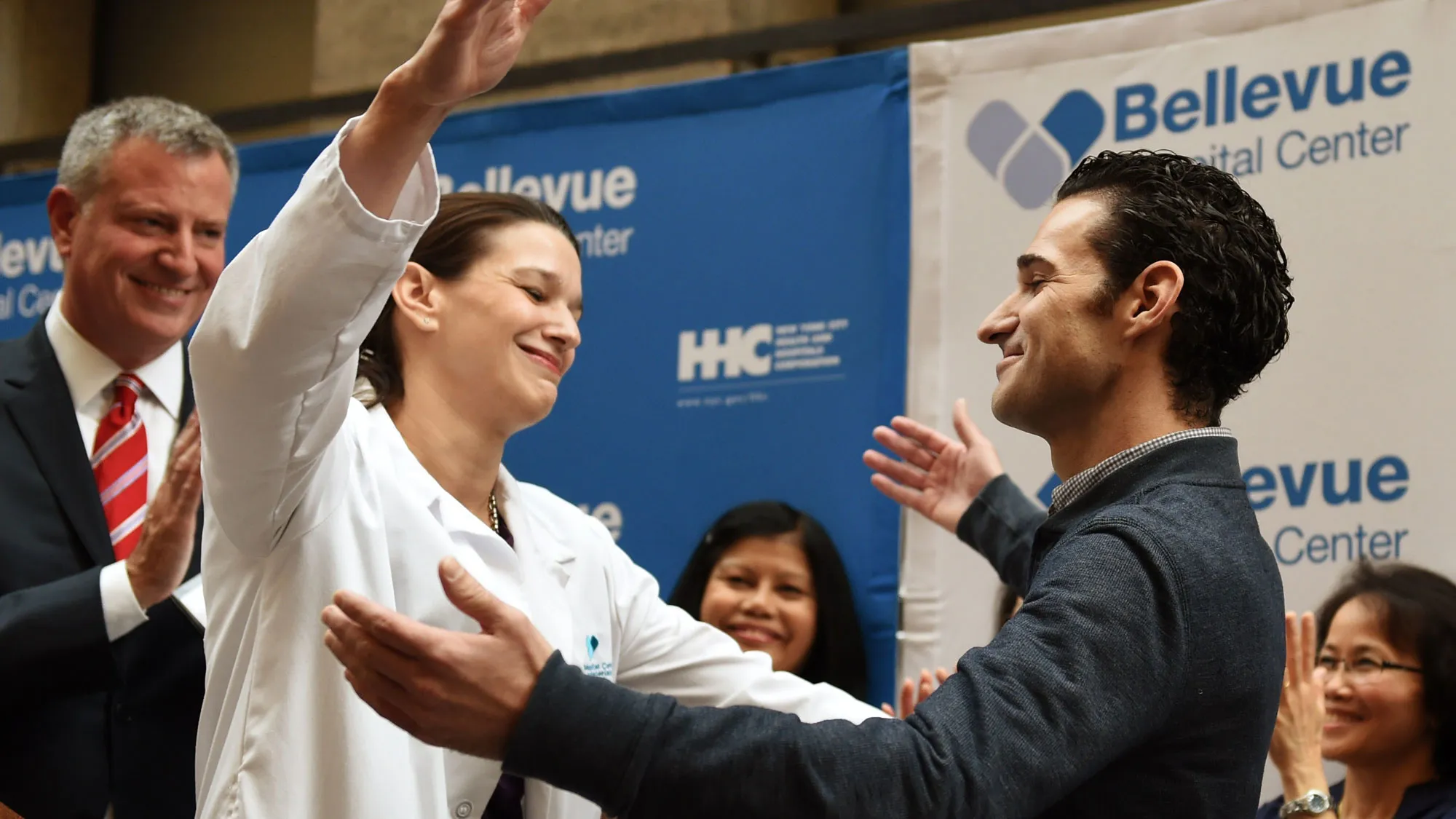 Dr. Craig Spencer (R) receives a hug from head physician Dr.Laura Evans at a news conference November 11, 2014 at Bellevue Hospital in New York.
