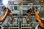 Robotic arms, manufactured by Kuka AG, operate on the production line at the Nampak Ltd. Bevcan Springs manufacturing plant in Springs, South Africa, on Thursday, Aug. 13, 2020. Manufacturing production, mining output and retail sales plunged in South Africa in the three months through June as the country imposed a strict lockdown on March 27 that shuttered almost all activity except essential services for five weeks.
