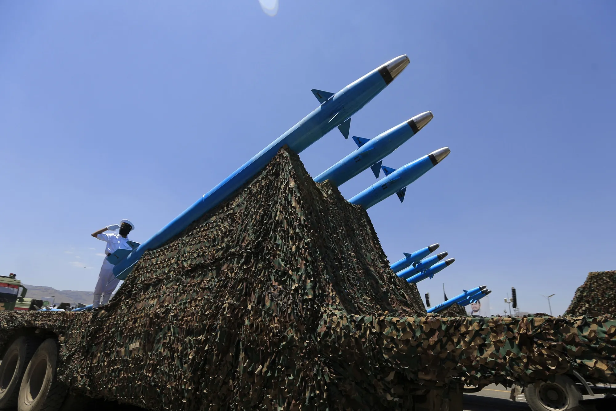 Houthi soldiers stand guard on a missile carrier during an official military parade in&nbsp;Sanaa, Yemen on Sept. 21.