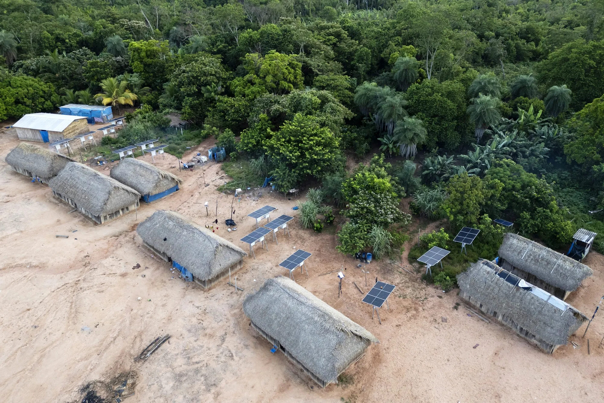 Solar panels sit next to houses in the village of Metuktire.&nbsp;Countries must spend at least one fifth of the TFFF funding to&nbsp;support&nbsp;indigenous peoples.