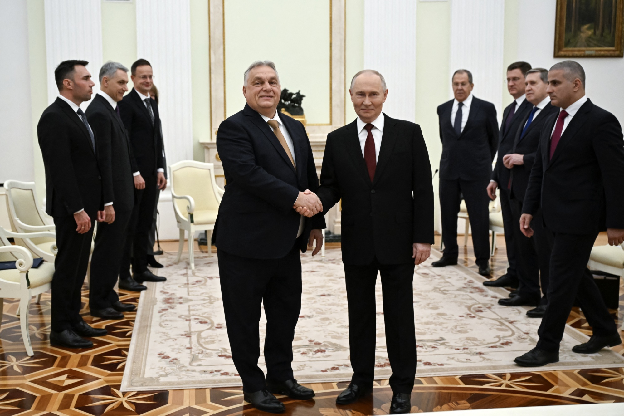 Hungary's Prime Minister Viktor Orban and Russia's President Vladimir Putin shake hands during a meeting at the Kremlin in Moscow on Nov. 28. Photographer: Alexander Nemenov/AFP/Getty Images