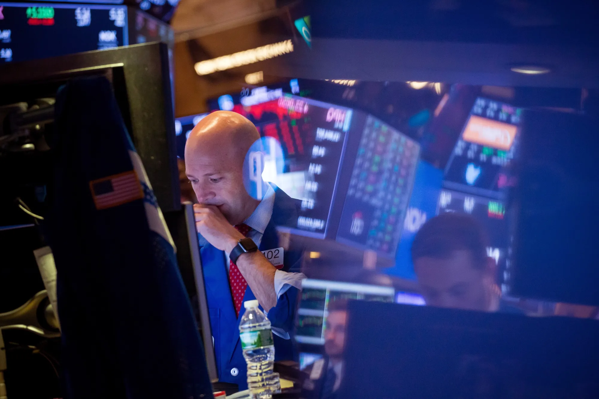 A trader works on the floor of the New York Stock Exchange (NYSE) in New York, U.S.