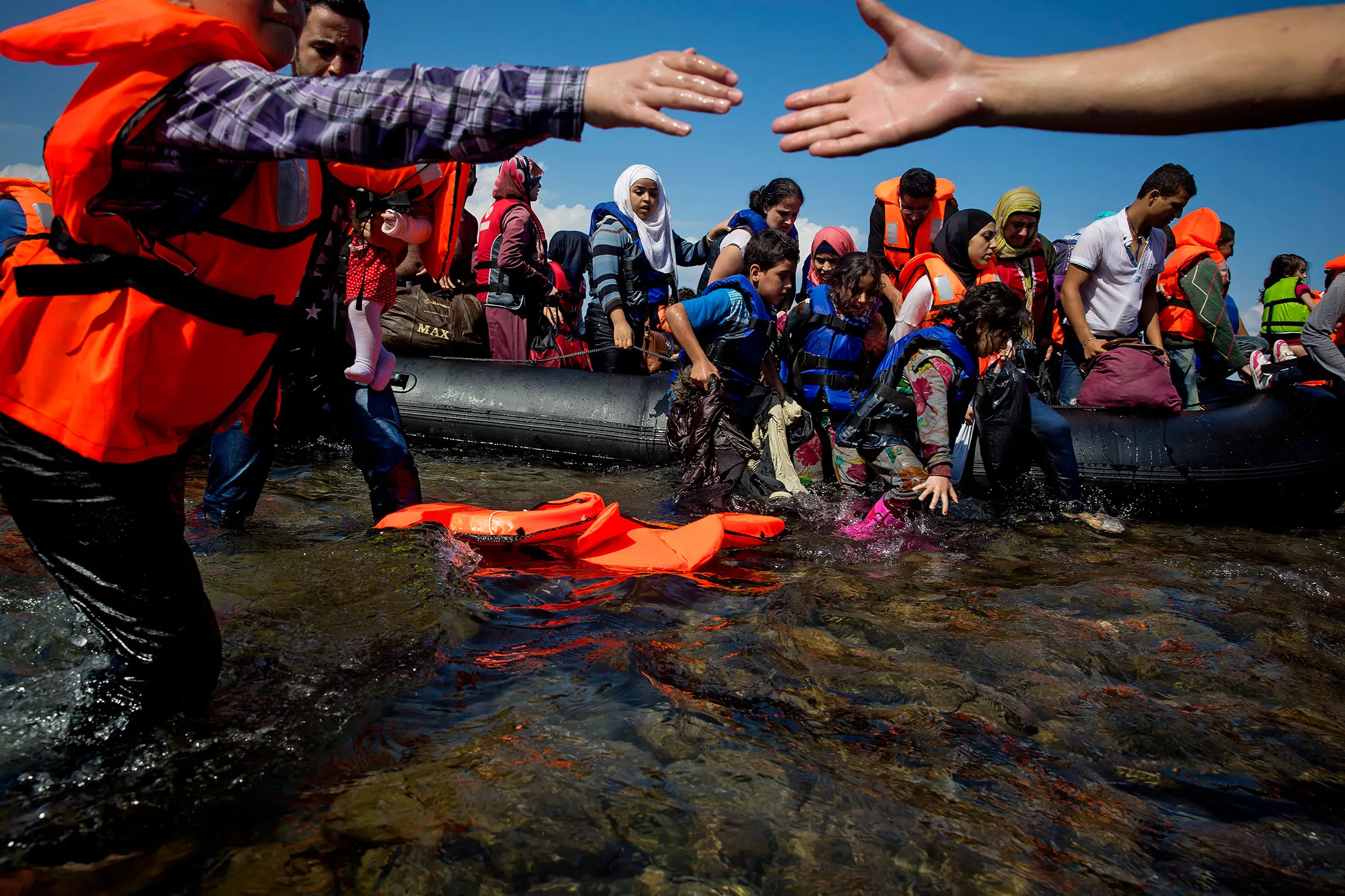 Refugees land in Lesbos, Greece in September 2015.
