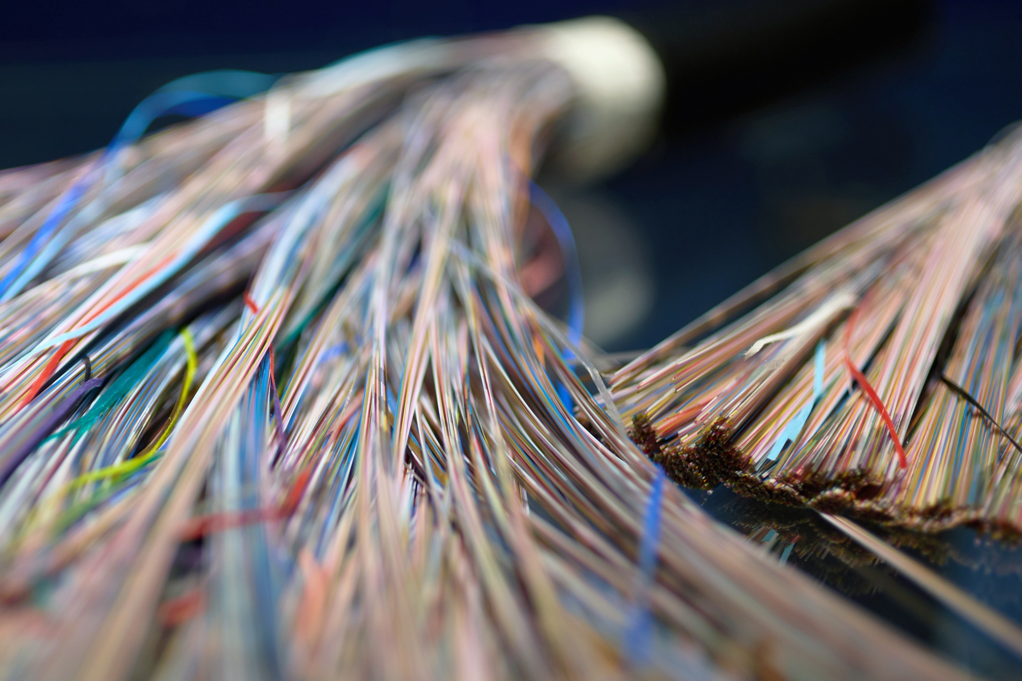 Fujikura Ltd. high-density fiber optic cables displayed at the company's headquarters in Tokyo, Japan, on Monday, Dec. 15, 2025. Fujikura's stock has surged about 1,400% over the last two years as new data centers globally have created an insatiable appetite for its cables. Photographer: Shoko Takayasu/Bloomberg