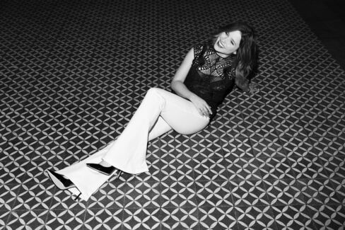Lace top by Jonathan Simkhai, Wide-leg trousers by Jonathan Simkhai, Romy 110mm heel pump by Jimmy Choo.