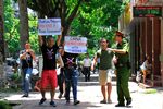 Activists hold anti-China banners in Hanoi on July 17.

