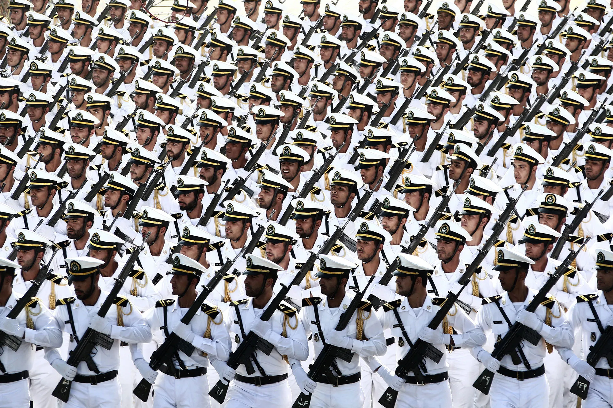 Iranian Naval troops march during a military parade in Tehran, on Sept. 22, 2014.
