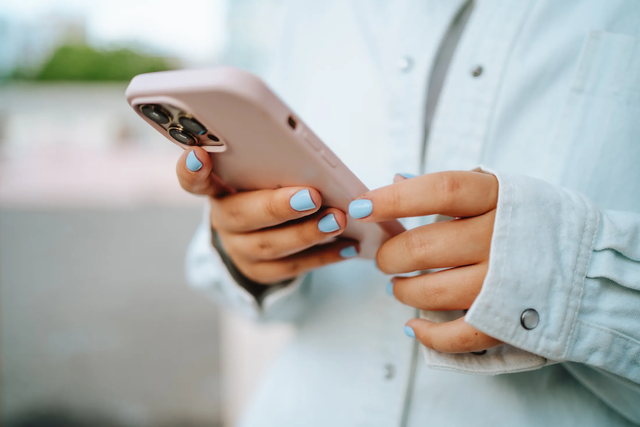 Teen using mobile phone