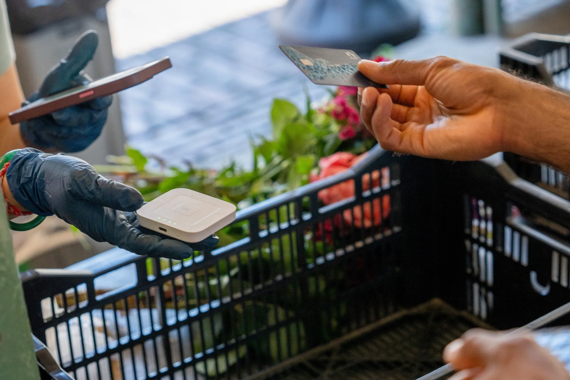 A customer pays at Pike Place Market in Seattle.