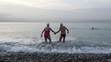 Older swimmers at beach