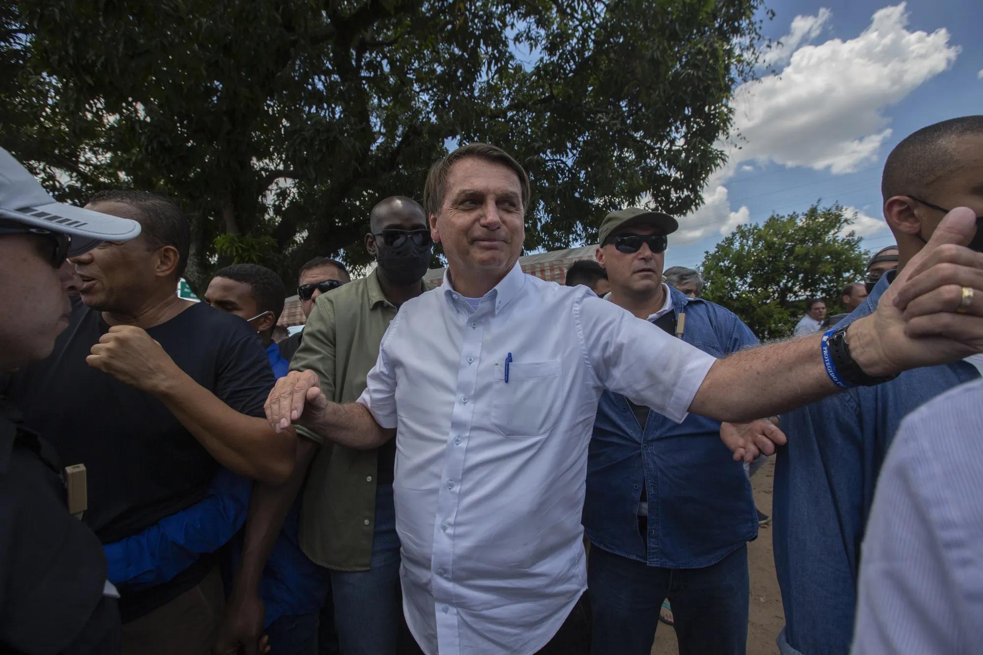 Jair Bolsonaro greets supporters in Rio de Janeiro on Nov. 29, 2020.