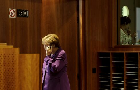 Chancellor Angela Merkel on her Mobile Phone