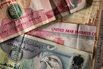 U.A.E. Dirham Banknotes As Economic Chills Grips Dubai