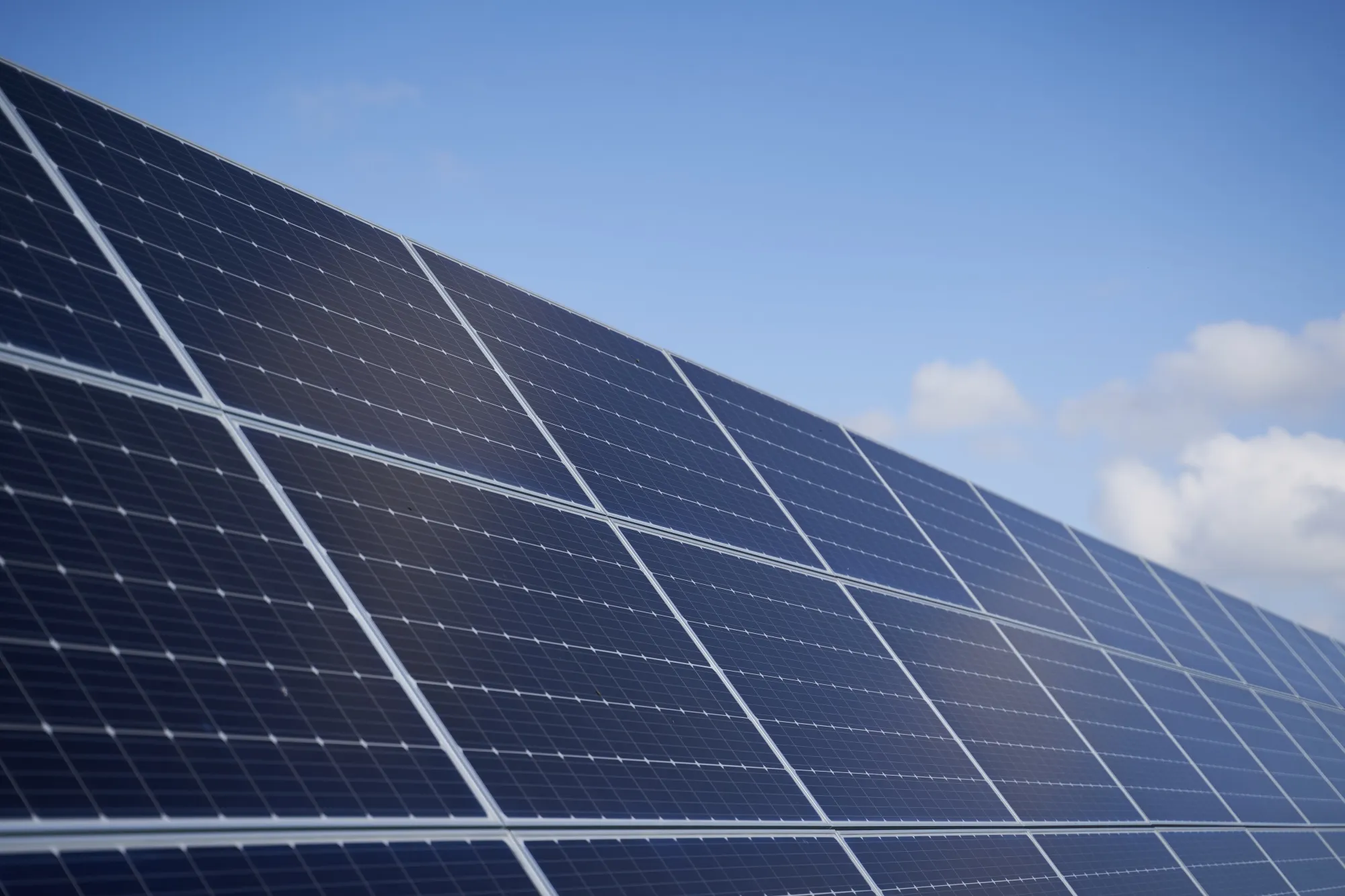 Solar Panels Against A Blue Sky