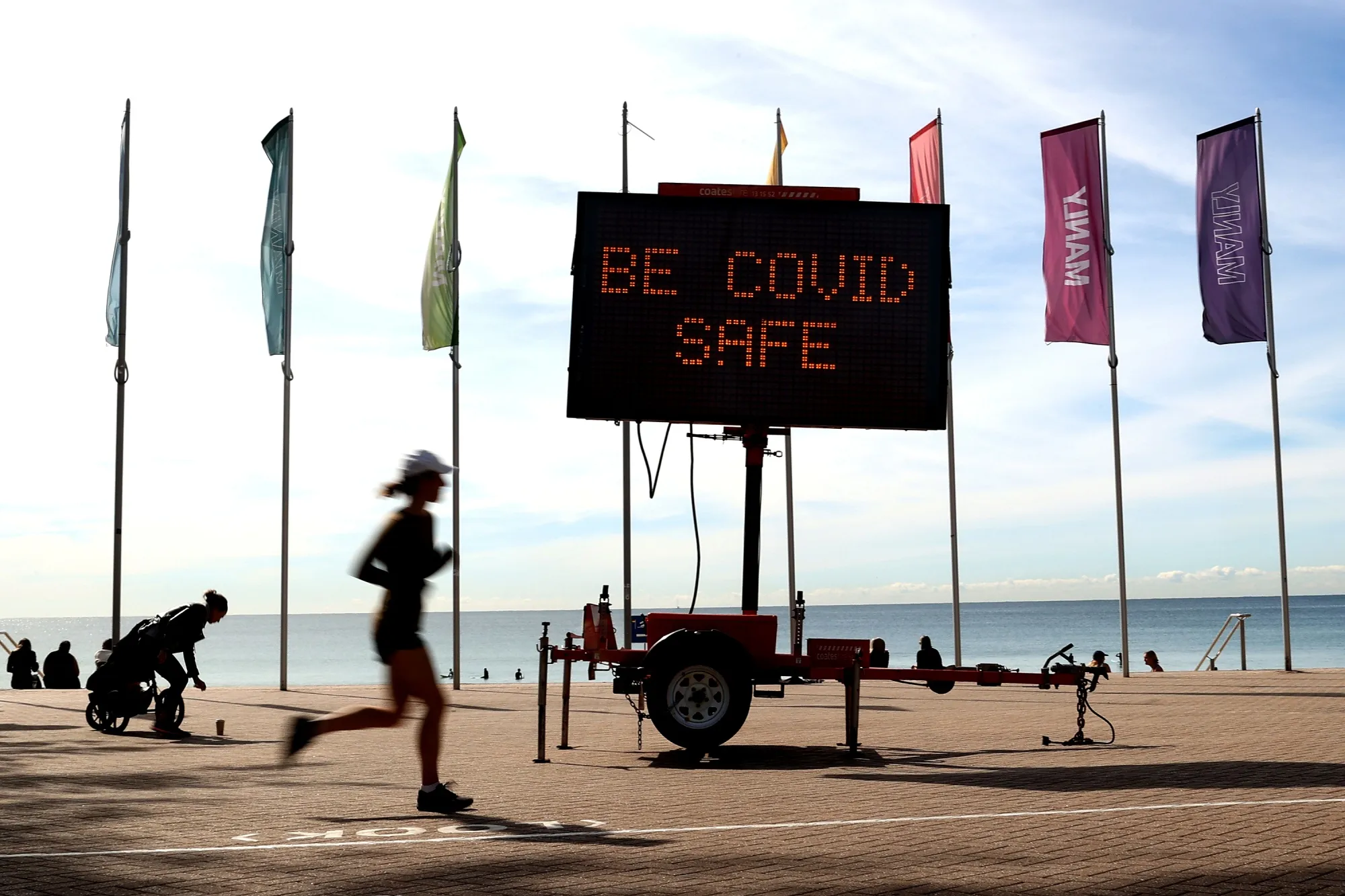 A Covid-19 public message sign at Manly Beach in Sydney, on Aug. 30.