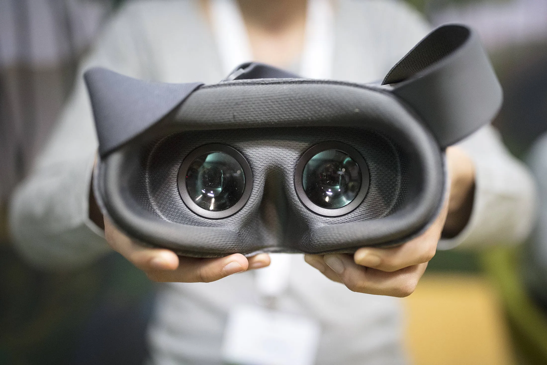 An employee displays the Google Inc. Daydream View virtual reality (VR) headset.
