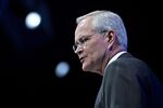 Exxon’s Chief Executive Officer Darren Woods