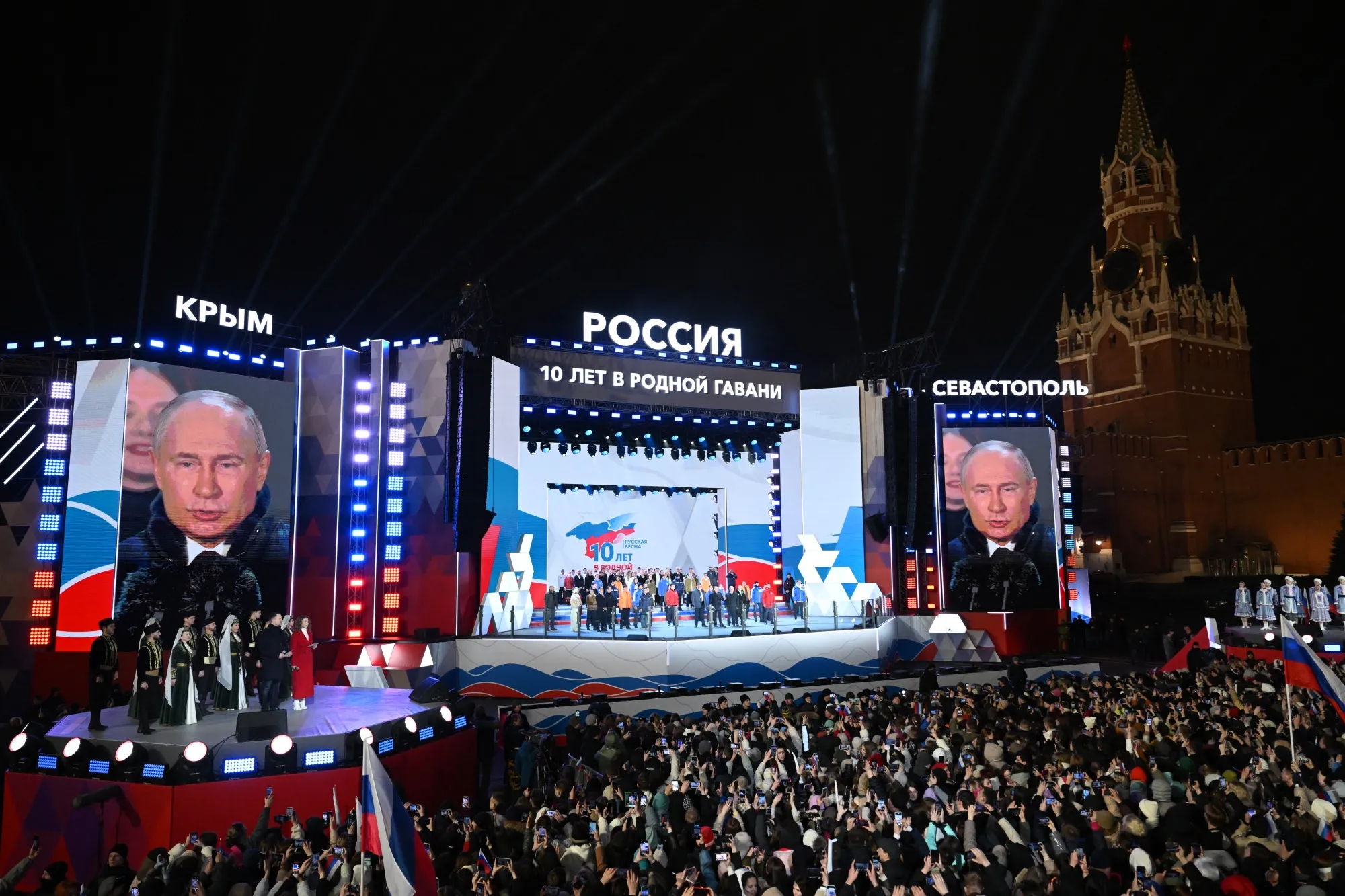 Russian President and presidential candidate Vladimir Putin addresses a crowd in Moscow Monday.