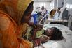 TOPSHOT-INDIA-HEALTH-CHILDREN-POVERTY